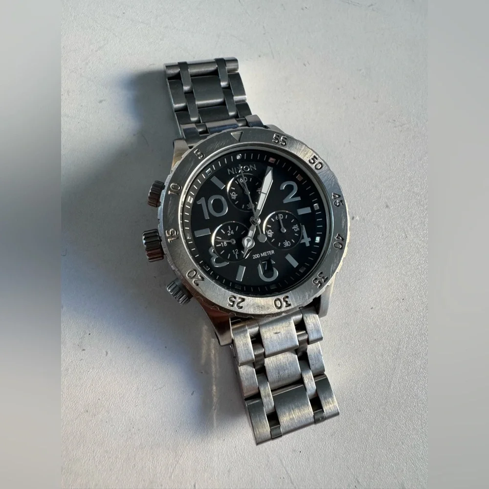 Nixon Men's Silver Stainless Steel Chronograph Watch with Black Dial